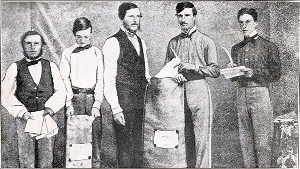 Five men with two mailbags